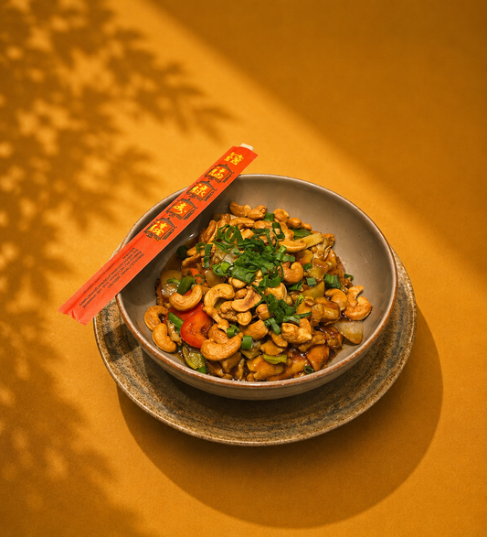 57. Kip cashew met diverse groenten